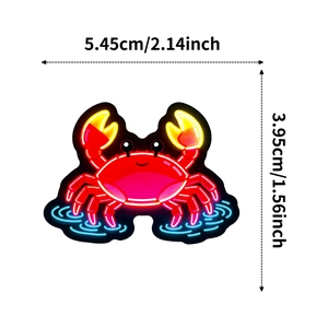 Neon crab sticker measurements 5.45x3.95cm with glowing red shell and blue water ripples