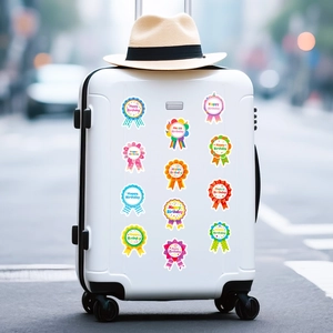 Colorful Happy Birthday ribbon stickers applied on a suitcase for party decoration