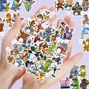 Close-up of hand holding colorful cartoon animal rock band stickers with white border