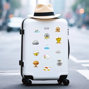 Close-up of cute cartoon weather stickers applied on a white suitcase for decoration