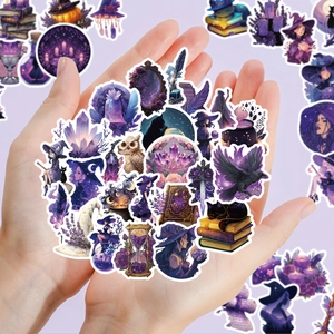 Detailed view of witch-themed purple magic stickers with crystal and potion motifs