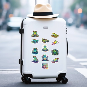 Assorted psychedelic frog stickers shown on a white suitcase for travel decoration