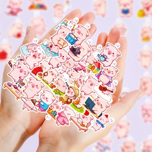 Close-up of cute pink pig graffiti stickers being held in hand to show size and quantity