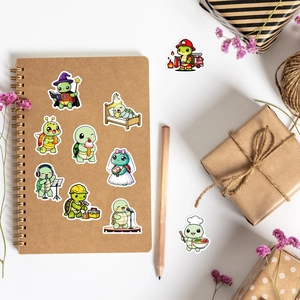Detail of cute turtle stickers with various professions on craft paper notebook