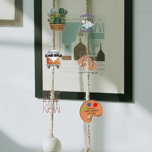 Detailed view of creative waterproof PET stickers with inspirational quotes on twine rope