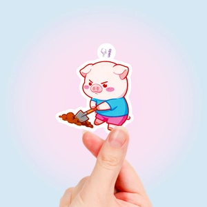 Close-up of cute cartoon pig sticker with open tab design for scrapbooking and DIY decor