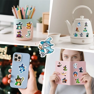 Scene showing cute wizard animal stickers applied on a kettle, phone case, and notebook