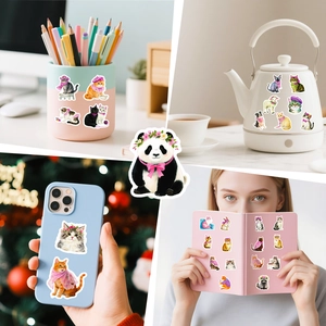Pink cartoon animal stickers shown as decor on water kettles and mobile phone cases