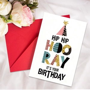 Detail of neon birthday card set with Hip Hip Hooray text, red envelope and white roses