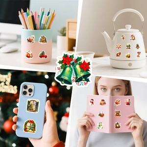 Detailed view of Christmas themed stickers used on mugs, laptops, and phone cases