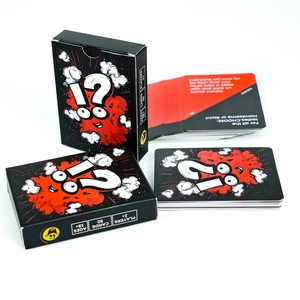 Macro detail of 50 English Truth or Dare game cards with black box for party play