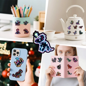 Neon dinosaur stickers applied to a water kettle, phone case, and notebook for decoration