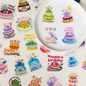 Detail of transparent PET cartoon birthday cake stickers for scrapbooking and decoration
