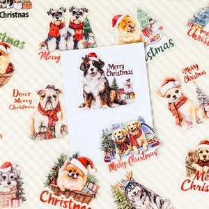 Flat lay of watercolor Christmas dog stickers including Husky and Golden Retriever on stripe