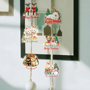 Close-up of cute Christmas dog stickers with watercolor pet designs hanging on string