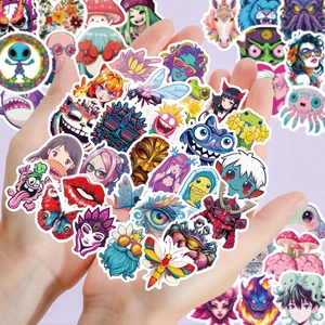 Close-up of hands holding a variety of waterproof Y2K cartoon stickers in bright colors
