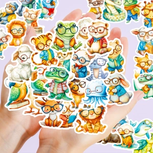 Hand holding vibrant watercolor animal stickers with glasses for laptop and planner deco