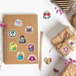 Vibrant Y2K style waterproof stickers on notebook and gift box with floral decor
