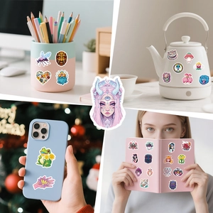 Detailed view of Y2K waterproof stickers on laptop, water bottle and phone case