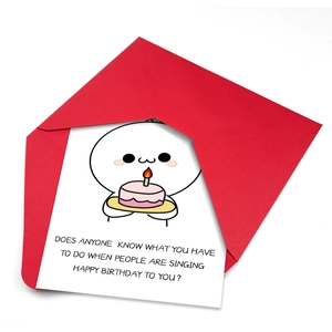 Funny Birthday Card with Pentol Cartoon character holding a cake and a red envelope