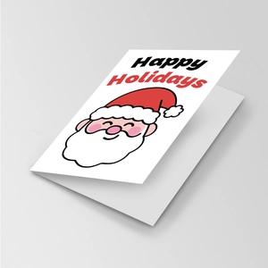 Detail shot of a minimalist Christmas greeting card with Santa Claus and Happy Holidays text
