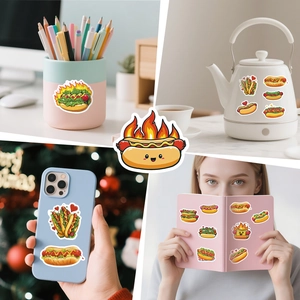 Detail view of cartoon hot dog stickers applied to a water kettle and pen holder
