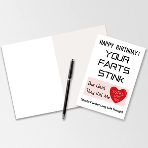 Close-up of minimalist funny birthday card with humor text and black signature pen