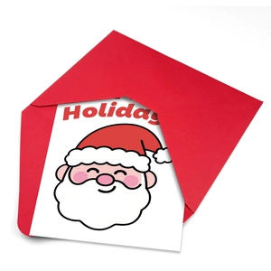 Detailed view of white Christmas card with cute Santa illustration and red envelope