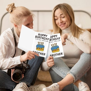 Detail of humorous birthday card for brother featuring blue cake and candle illustration