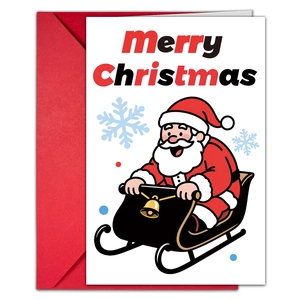 Close-up of a large Christmas card with Santa Claus on a sled and a bright red envelope