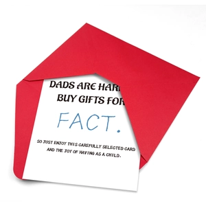 Detail of creative Father's Day greeting card with red envelope and minimalist typography