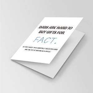 Close-up of minimalist white Father's Day greeting card with bold creative typography