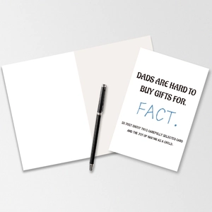 Detail of minimalist Father's Day greeting card with humorous text and smooth paper texture
