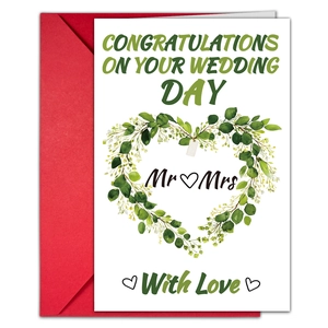 Detailed view of Mr and Mrs wedding card with green leaf heart and red envelope set