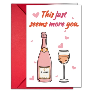 Detalle de tarjeta de San Valentín con diseño de champán y sobre rojo a juego