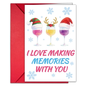 Detail of Christmas greeting card with festive glasses and red envelope for memories