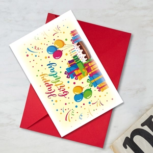 Detail of cartoon birthday card with colorful balloons and a red envelope set