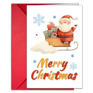 Gros plan de la carte de Noël avec illustration de Père Noël et enveloppe rouge
