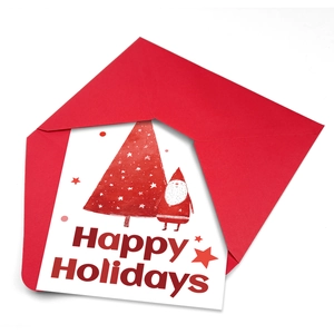 Gros plan d'une carte de Noël Happy Holidays avec une enveloppe rouge festive
