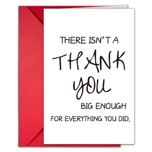 Detail of elegant white greeting card with red envelope featuring bold black typography