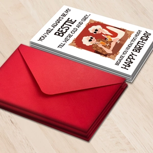 Detail showing humorous birthday card with older ladies illustration and red envelopes