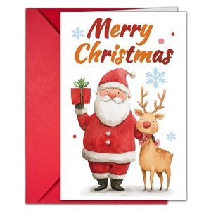 Vue détaillée d'une carte de Joyeux Noël avec le Père Noël, un renne et une enveloppe