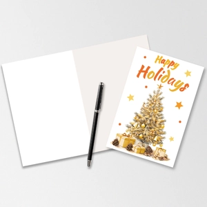 Detail of a Christmas card set with golden tree patterns and blank inner page