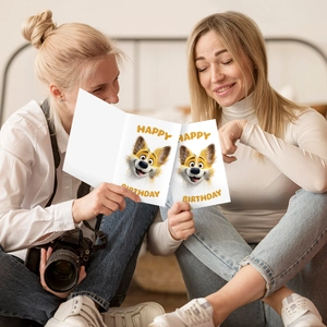 Women holding two cute cartoon dog happy birthday cards in a cozy home setting