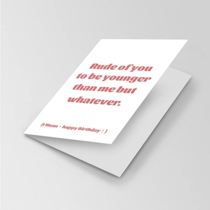 Detail view of a white humor greeting card with pink text and diagonal fold design