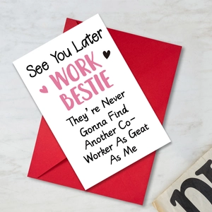 Detailed view of coworker farewell card with red envelope on marble background