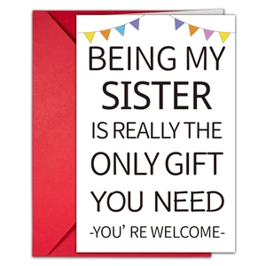 Detail view of large birthday card with humorous text and a bold red envelope set