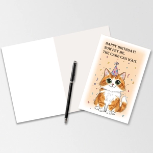 Detail of cartoon orange cat birthday card with interior fold-out and stylish black pen
