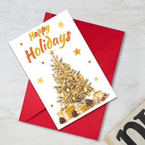 Detailed view of a holiday greeting card with a red envelope and Happy Holidays text