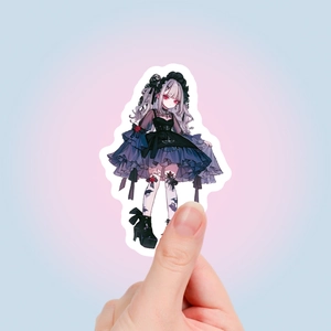 Nahaufnahme eines Gothic-Mädchen-Stickers mit feinen Details, um die Größe zu zeigen
